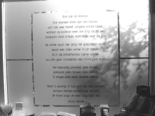 raam met gedicht in boekhandel te Harlingen